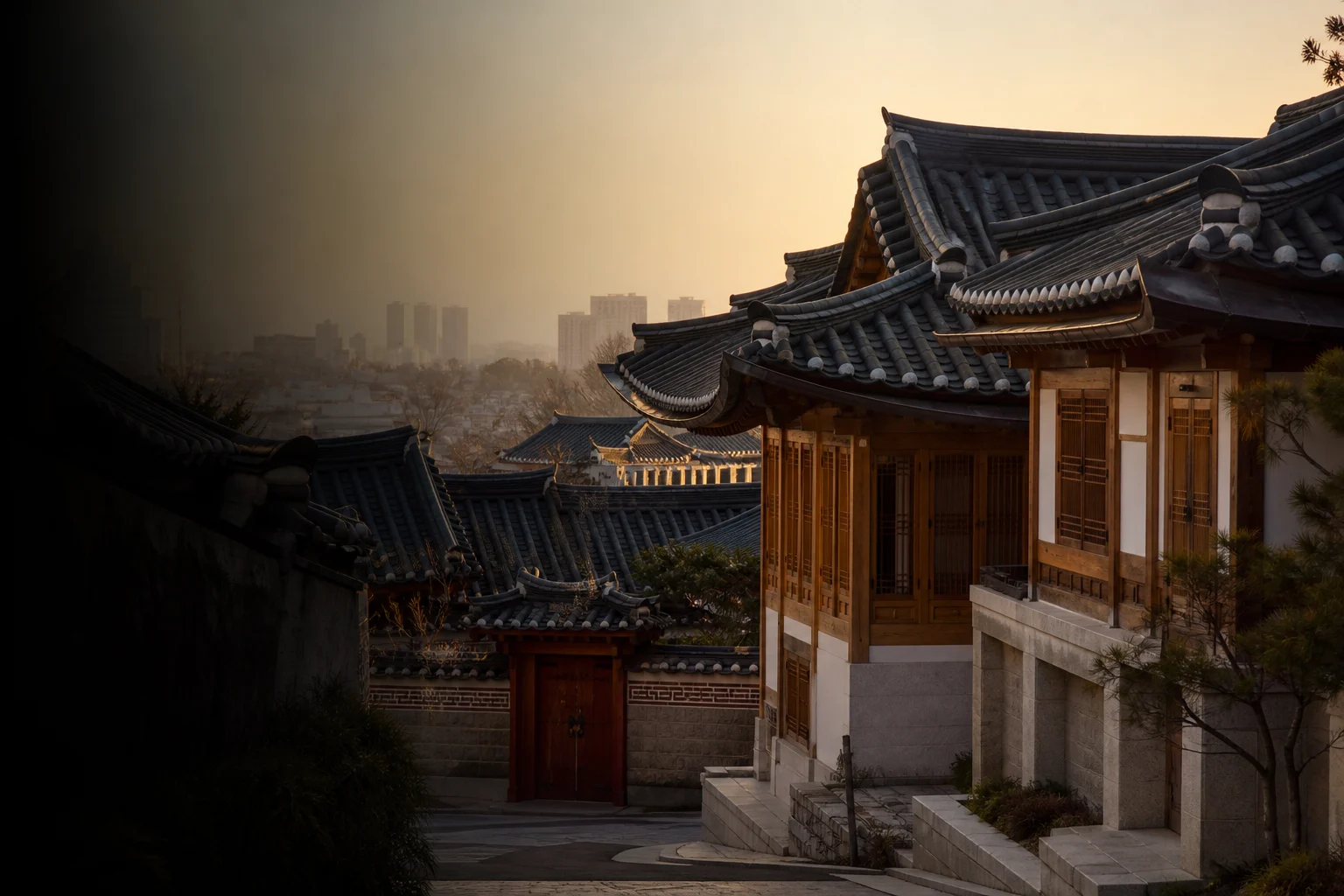 Traditional hanok rooftops overlooking Seoul at sunrise